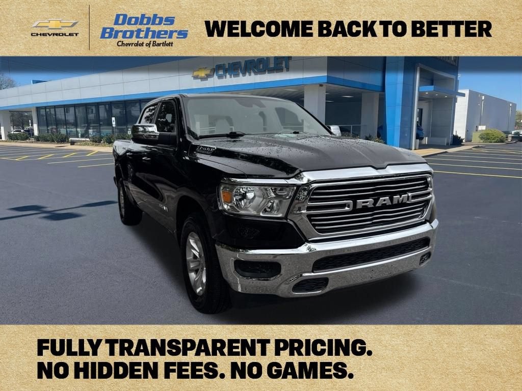 2024 RAM 1500 Laramie in Black — front three-quarter view